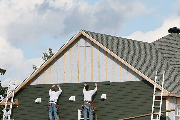 Professional Siding Installation technician working in Grove City, OH
